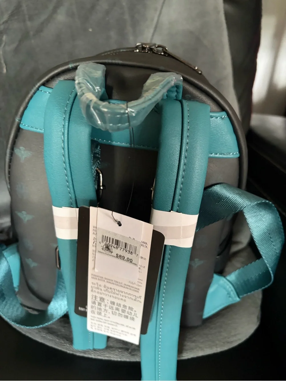 Loungefly Haunted Mansion Glow in the Dark Mini Backpack in Black and Teal
